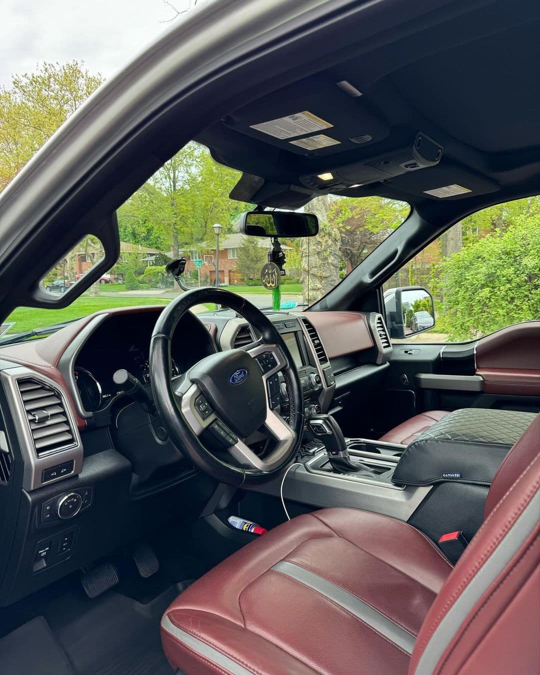 Truck interior — red leather seats — after