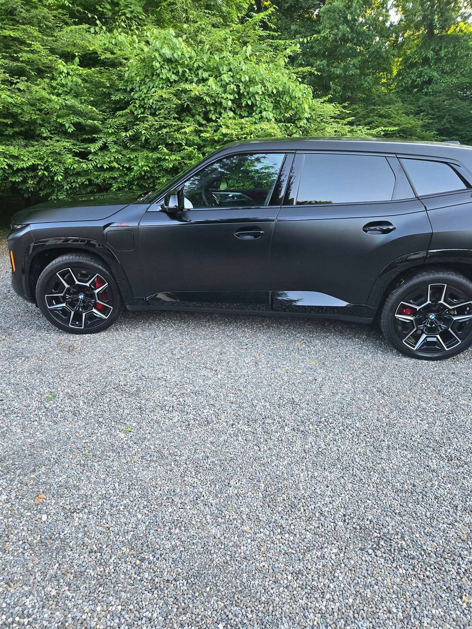 Matte black BMW XM ceramic coating satin finish in Converse