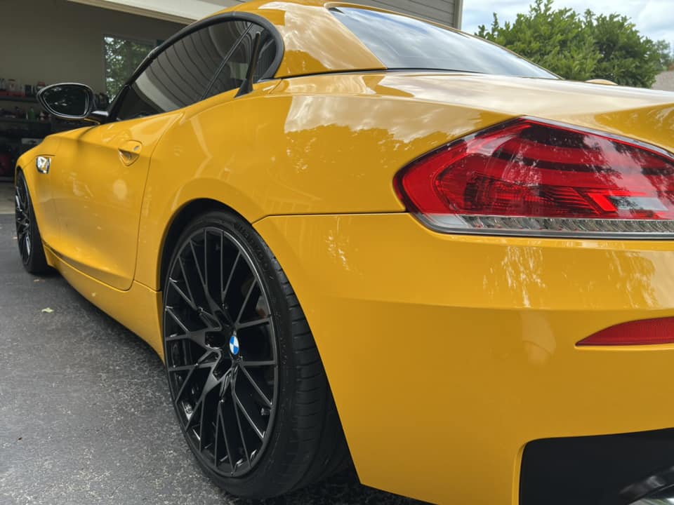 Yellow BMW Z4 ceramic coating mirror finish in Everett