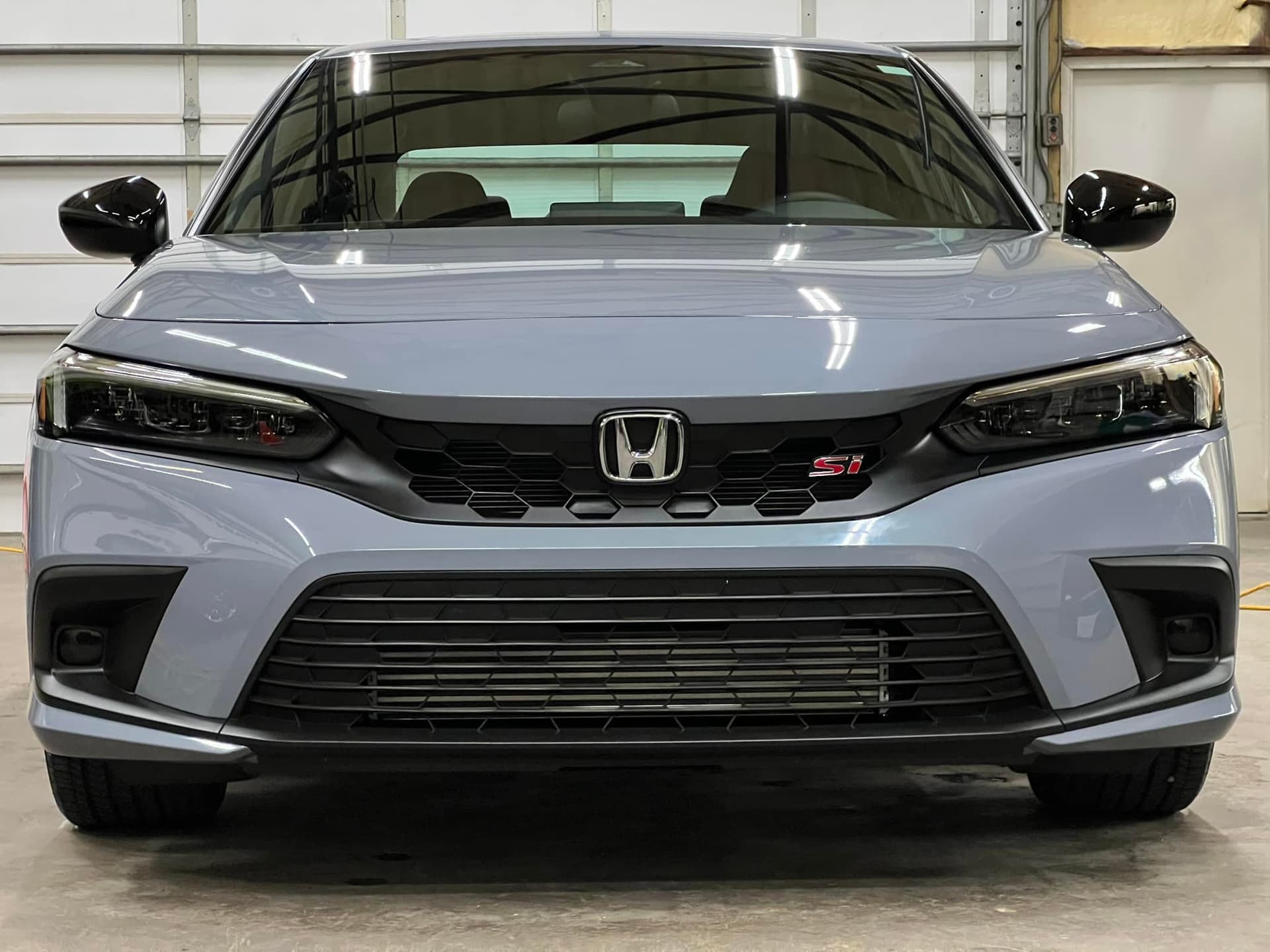 Gray Honda Civic Si ceramic coating mirror finish in Harvest
