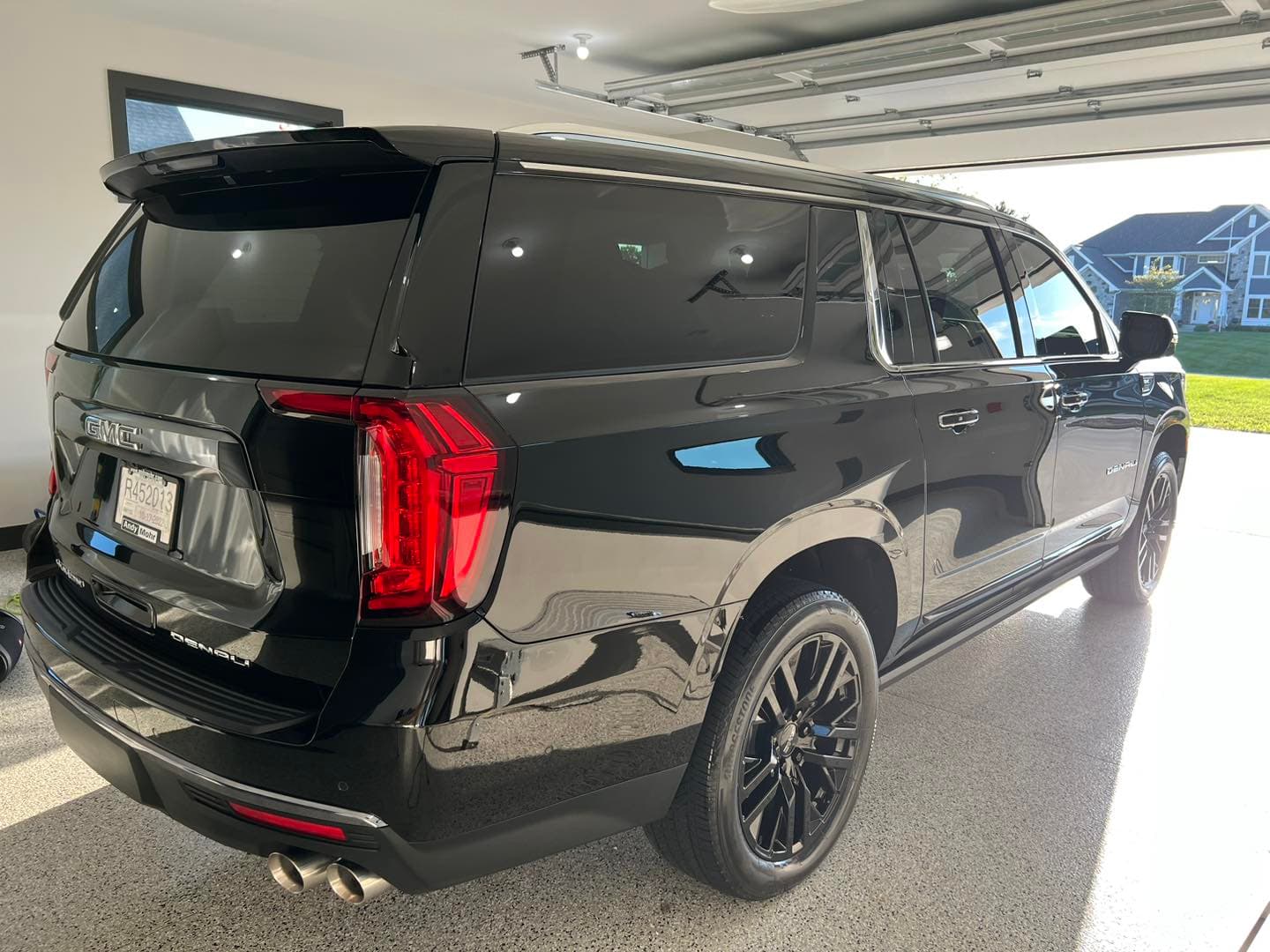 Black GMC Yukon Denali ceramic coating mirror finish in Lake Mary