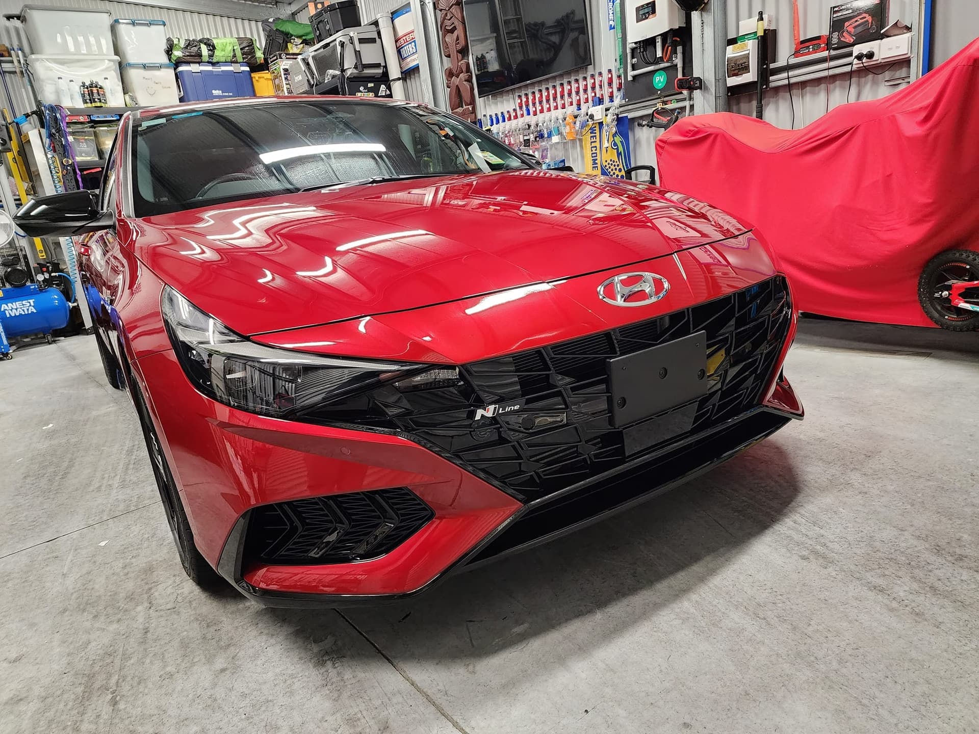 Red Hyundai Elantra N Line ceramic coating mirror finish in Minnetonka