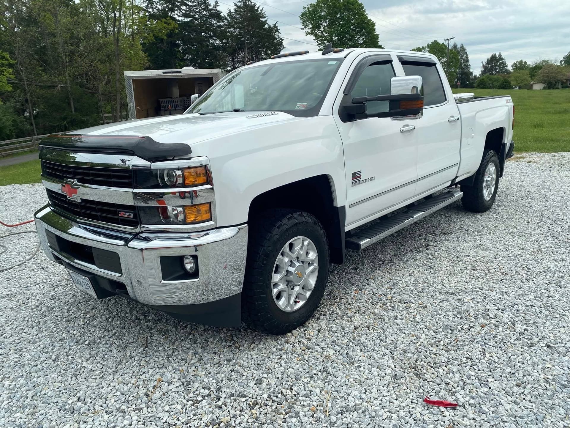 White Chevrolet Silverado 2500 HD Z71 exterior detailing with wax finish in Georgetown