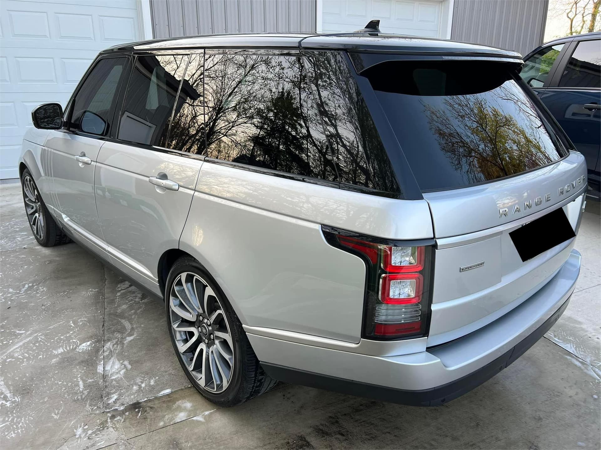 Silver Range Rover Supercharged exterior detailing with wax finish in Grove City