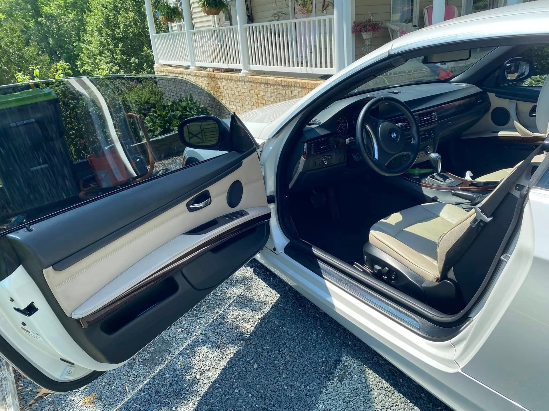 Beige leather BMW interior with wood trim cleaned in Athens