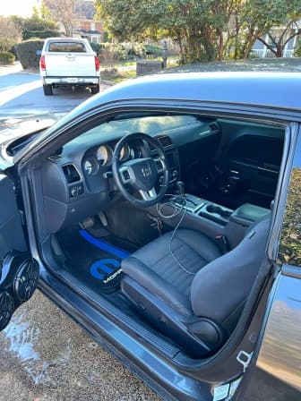 Dodge interior with custom Mopar floor mat cleaned in Aurora