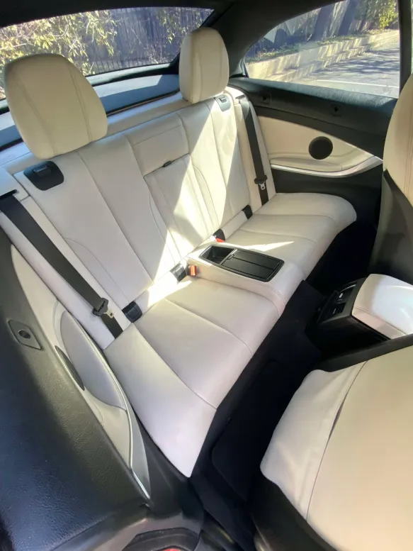White leather rear bench seats cleaned in Hoover