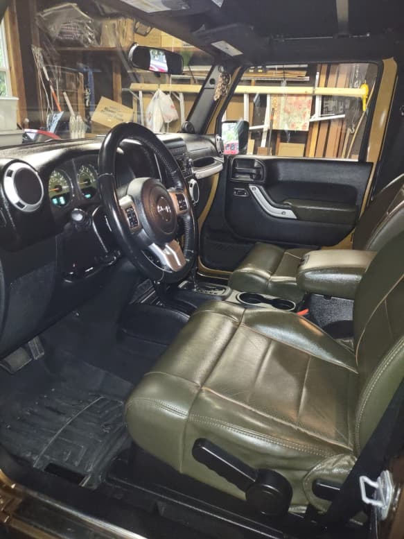 Olive green leather Jeep Wrangler interior detailed in Jersey City