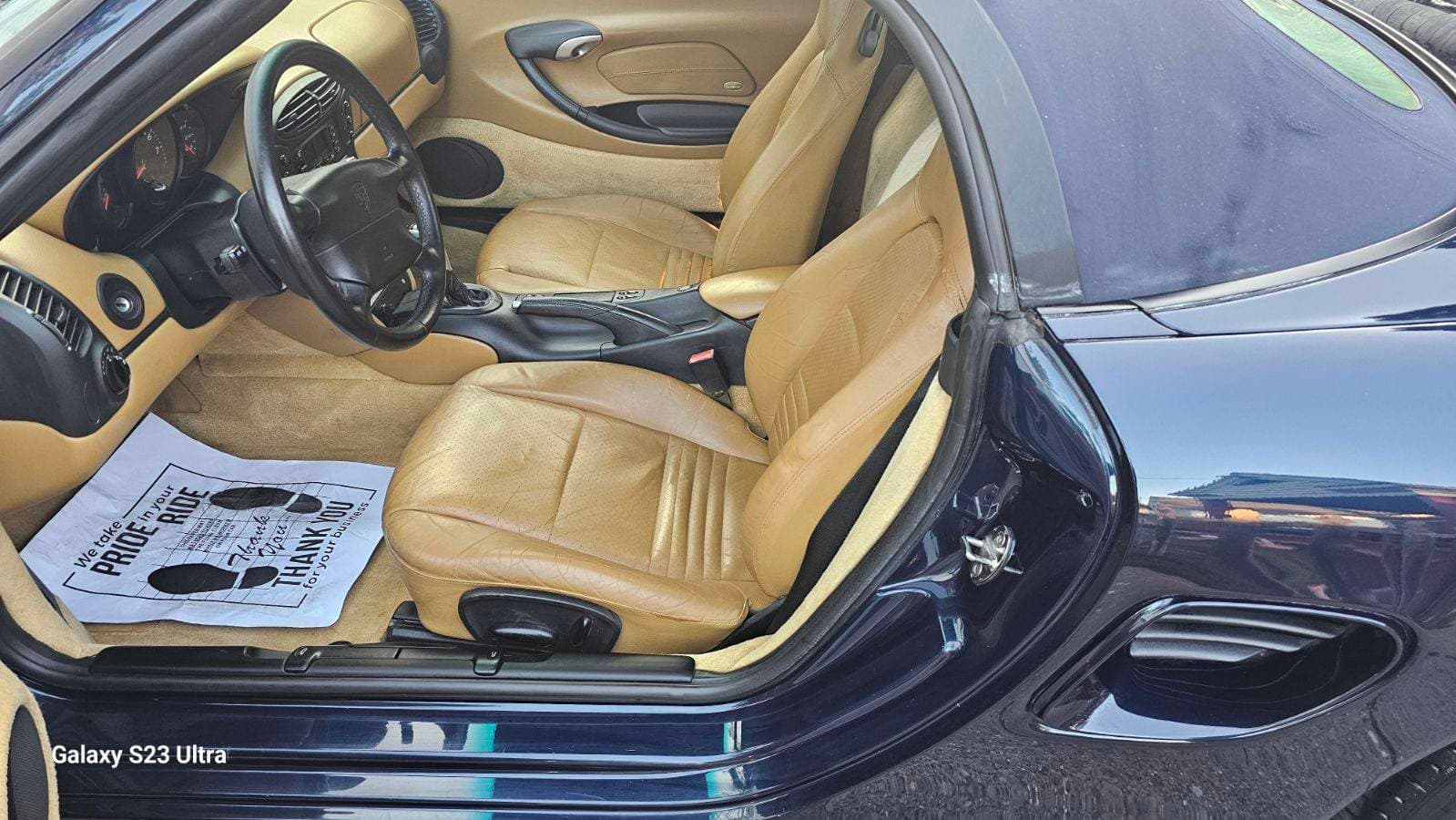 Tan leather Porsche sports car interior detailed in Pooler