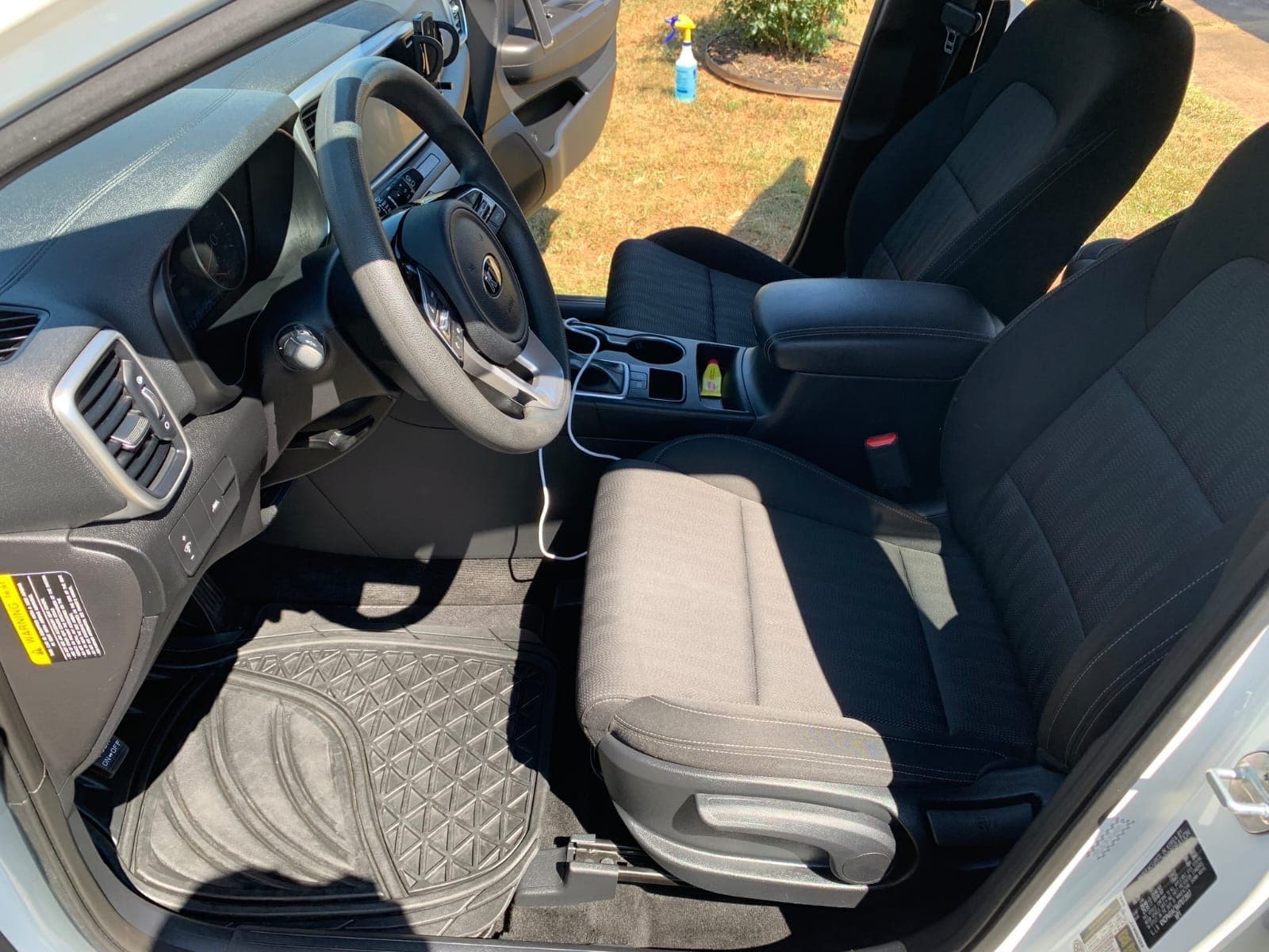 Black cloth front seats and all-weather rubber mat cleaned in Sunnyvale