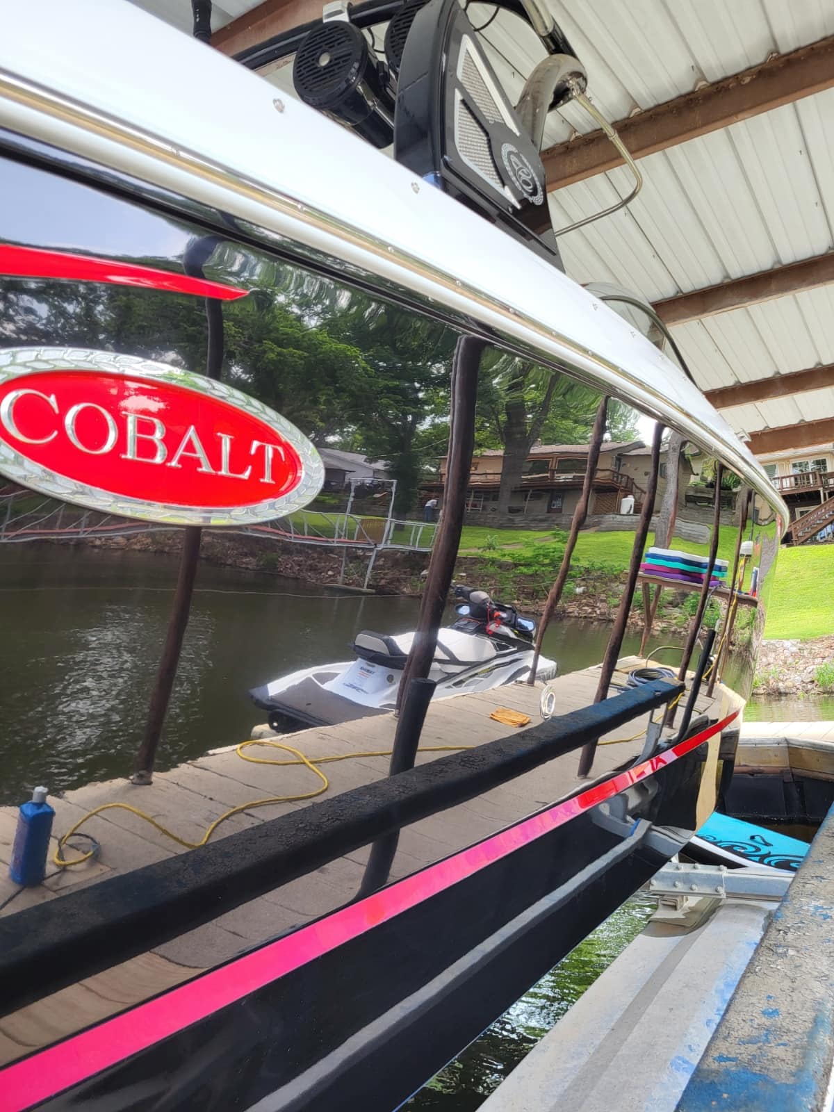 Gel coat polishing and clay bar treatment on a boat in Columbus