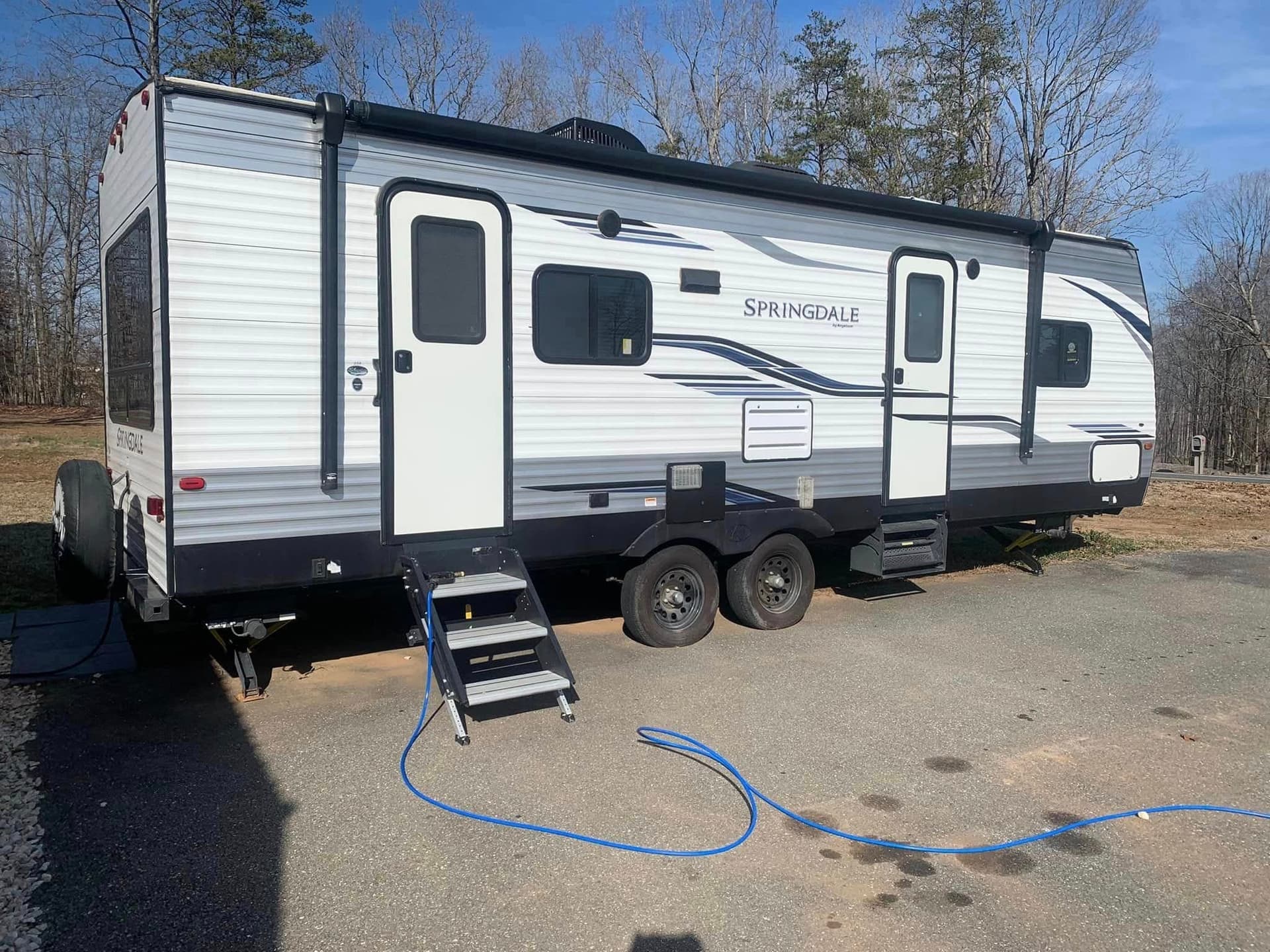 Clay bar and polishing treatment on an RV exterior panel in Columbus