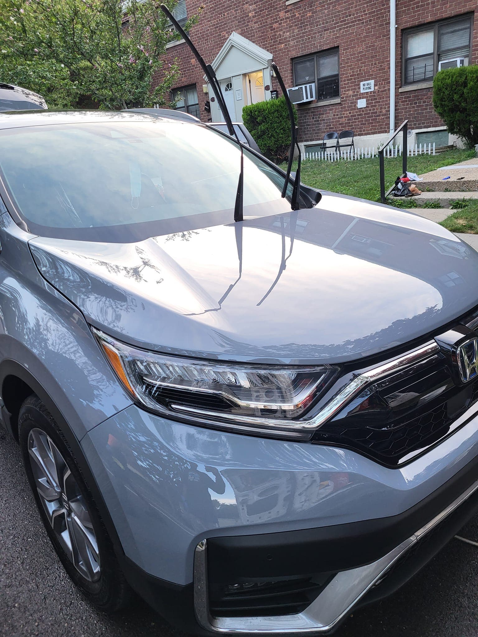 Light gray Honda CR-V hood showing smooth contaminant-free finish after clay bar