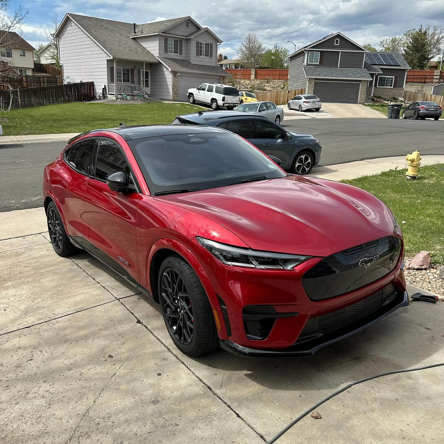 Red Ford Mustang Mach-E with brilliant gloss after clay bar and polish