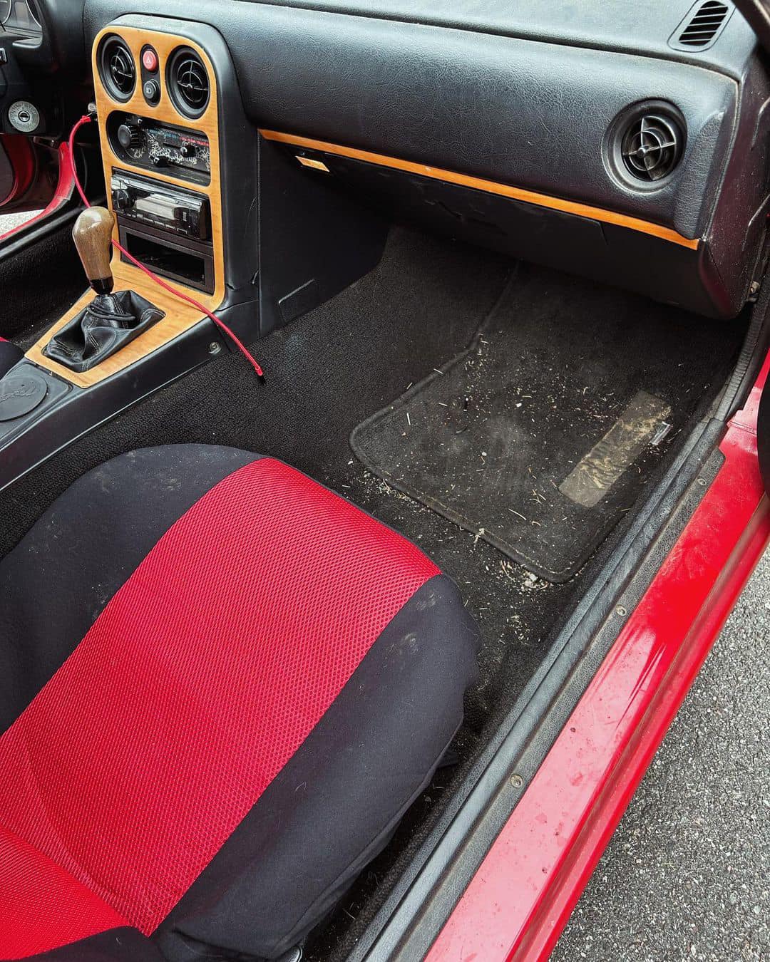 Interior mats & footwell — deep clean after